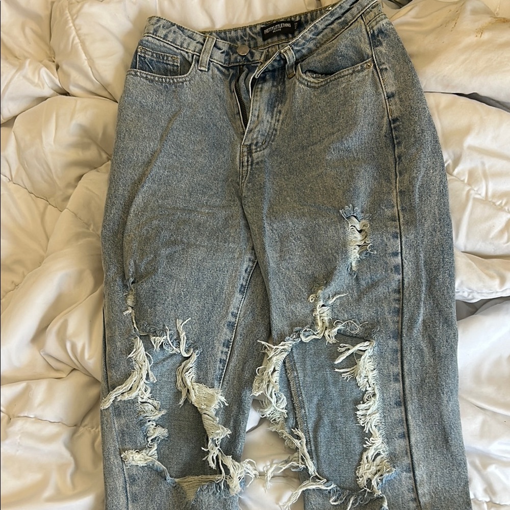 Distressed Light Blue Jeans